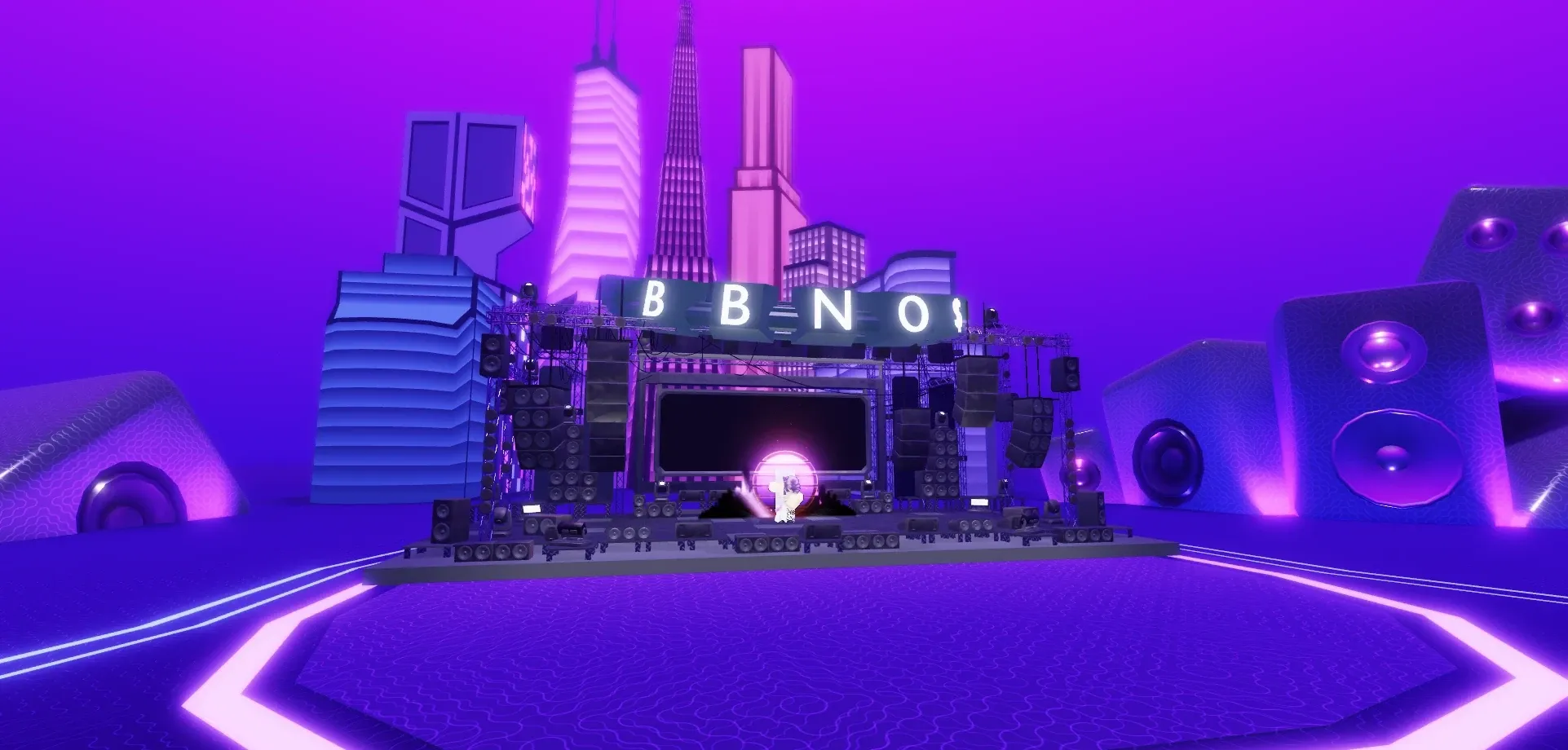 The bbno$ stage in the hub, lit and empty, a pink and violet skyline behind it